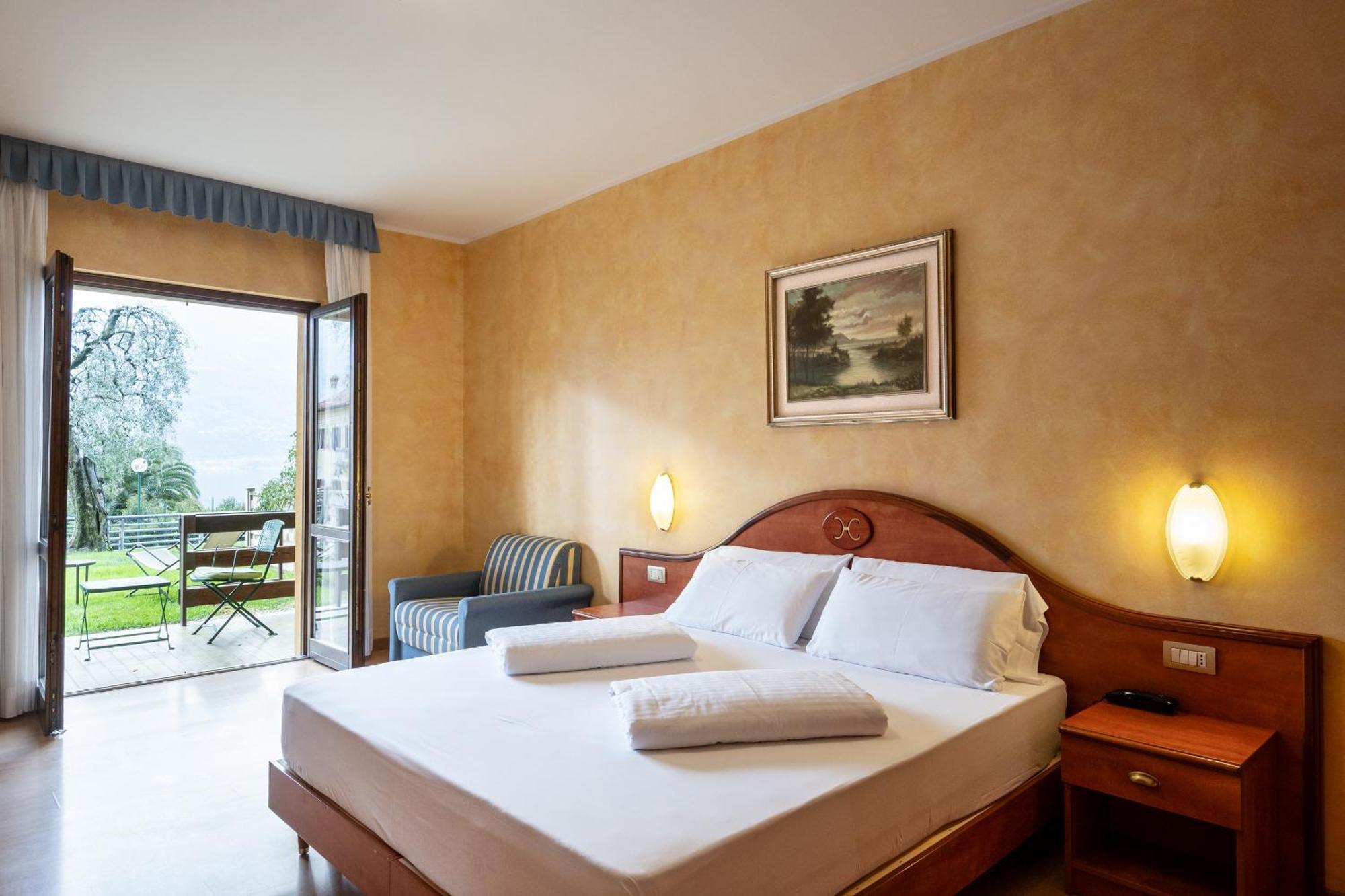 Hotel Caravel ลีโมเนซุลการ์ดา ภายนอก รูปภาพ